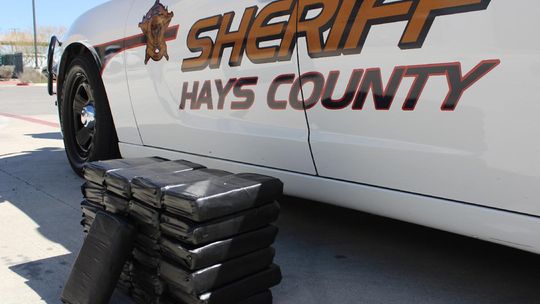 CONTRIBUTED PHOTO The siezed cocaine rests near a patrol car.