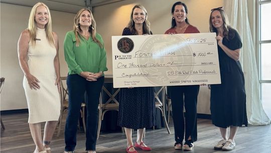 DS Elite donates $1,000 to Foster Village