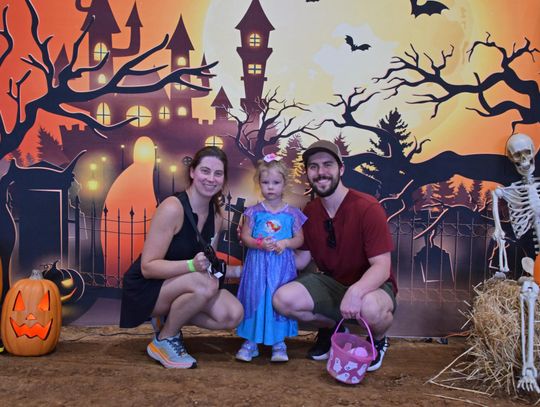 PHOTO BY LAURIE ANDERSON The festival included a spooky backdrop for family photos.