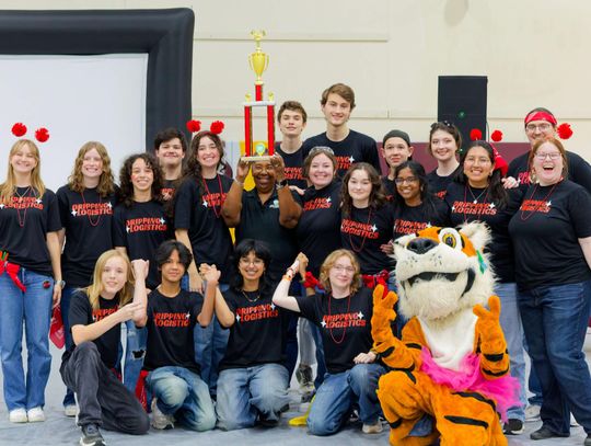 PHOTO BY LAURIE ANDERSON Teams compete in the Dripping Springs High School gym.
