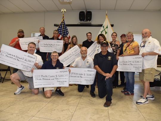 PHOTO BY JOHN PACHECO Eight non-profit representatives received end of year donations from the St. Martin de Porres Knights of Columbus Council 11695.