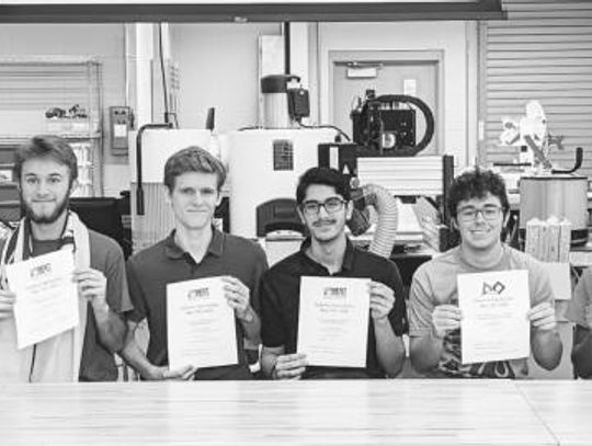 Robotics students sign to continue education collegiately