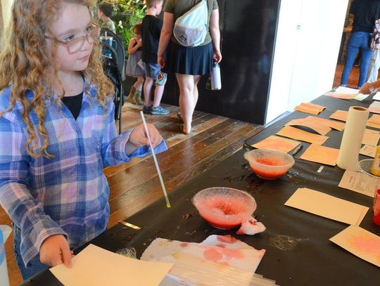 CONTRIBUTED PHOTO A museum guest participates in a hands-on science activity.