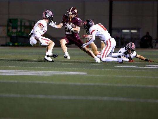 Photos courtesy of Cortni Reid Senior running back Jaceton Gotta shakes a Vista Ridge defender.