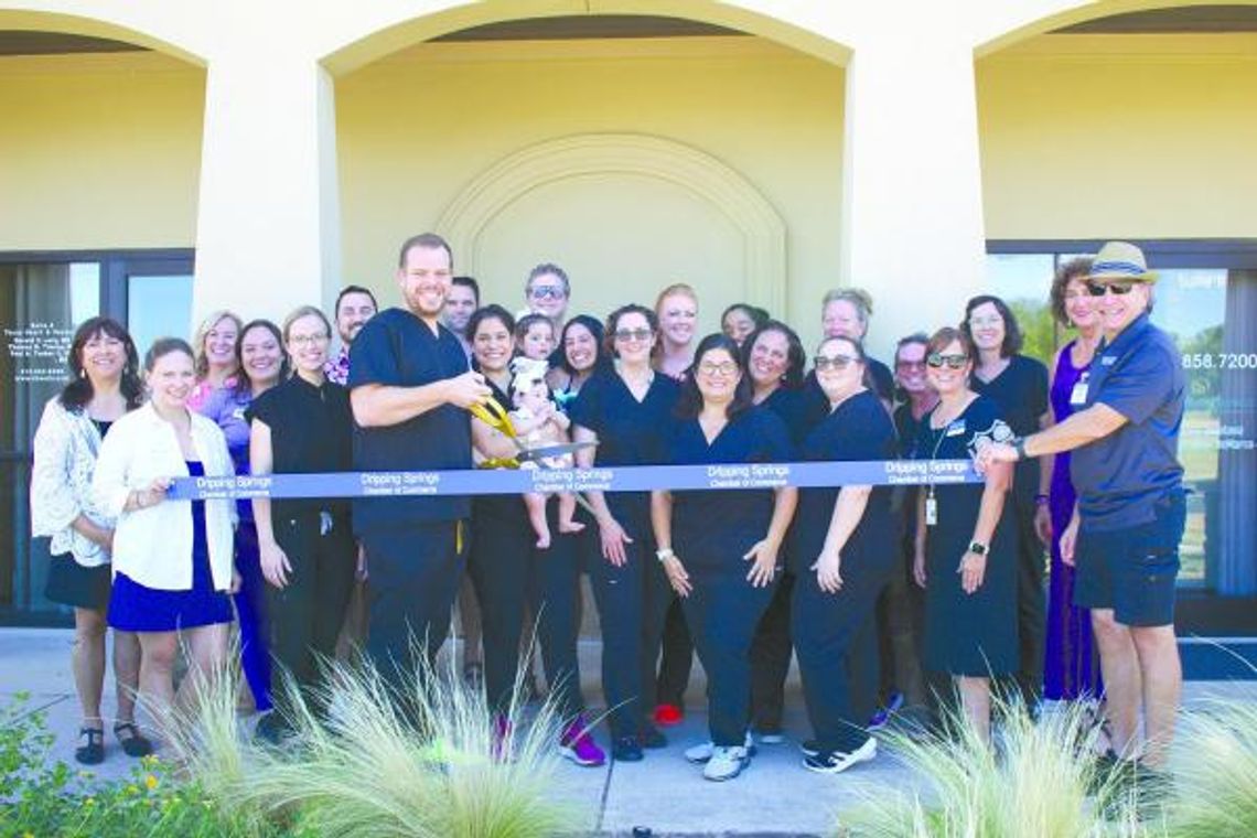 Dental office celebrates opening with ribbon cutting