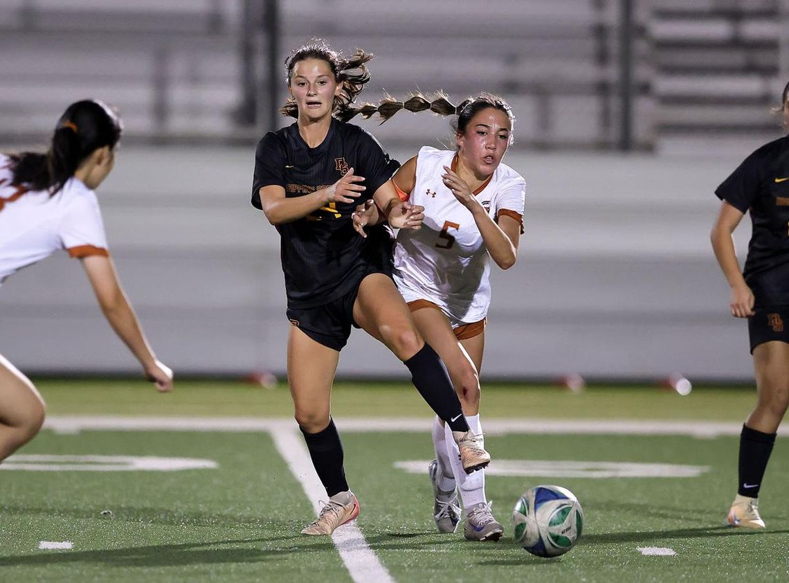 Lady Tigers soccer team moving on PHOTO BY VINCE CURLETTA Lily Ruff (#24) protects the ball from a Westwood player in Thursday's playoff game