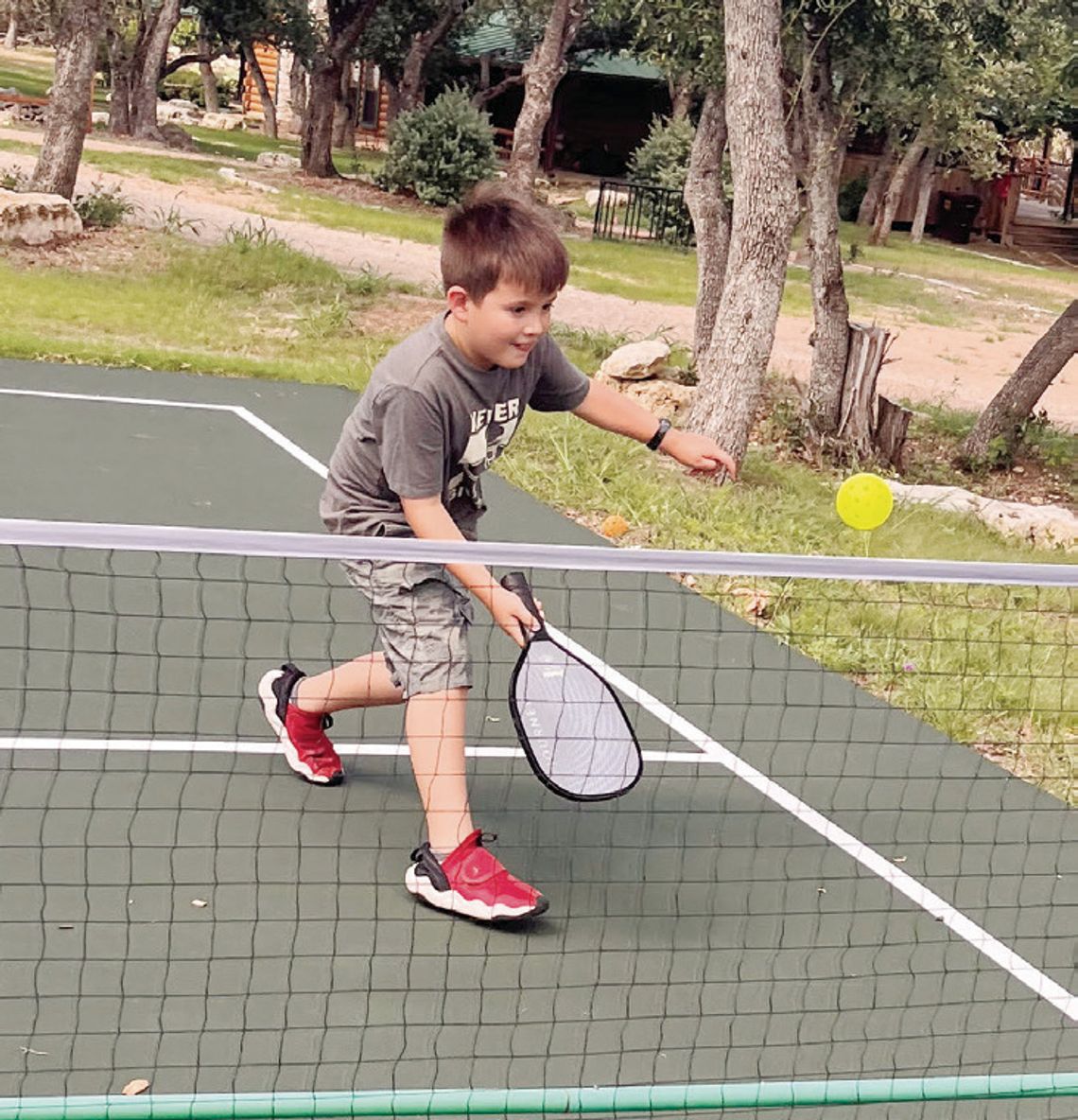 Pickleball camp for kids aims to replace screen time with an introduction to the game