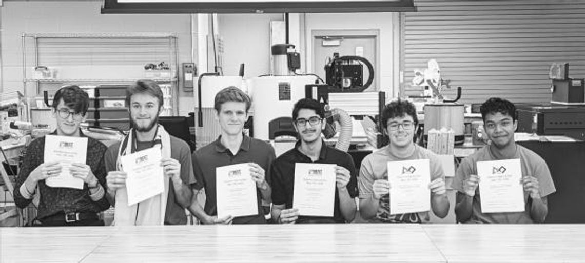 Robotics students sign to continue education collegiately