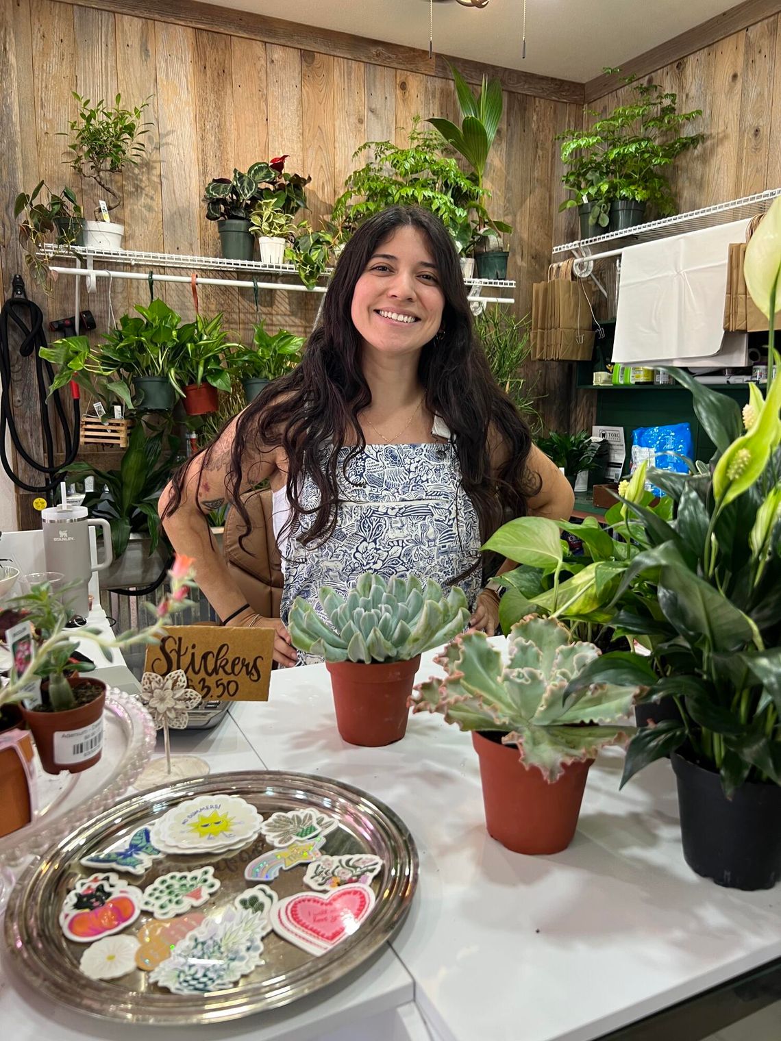 PHOTO BY LAURIE ANDERSON Marisol Soza stands in her new shop, Terra Cotta Botanical Boutique.