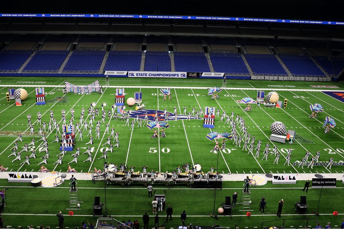 Tiger Band performs at UIL State Marching Competition PHOTO BY CARYN PACELLI The Dripping Springs Tiger Band fills the Alamodome field with music and color for the UIL State Marching Contest.