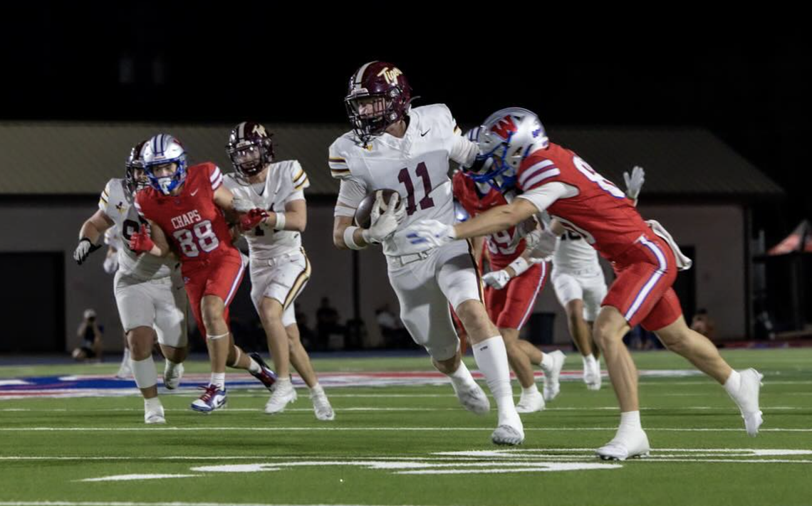 Tigers outlast Westlake for exciting win PHOTO BY CORTNI REID Colton Hanson carries the ball for the Tigers.