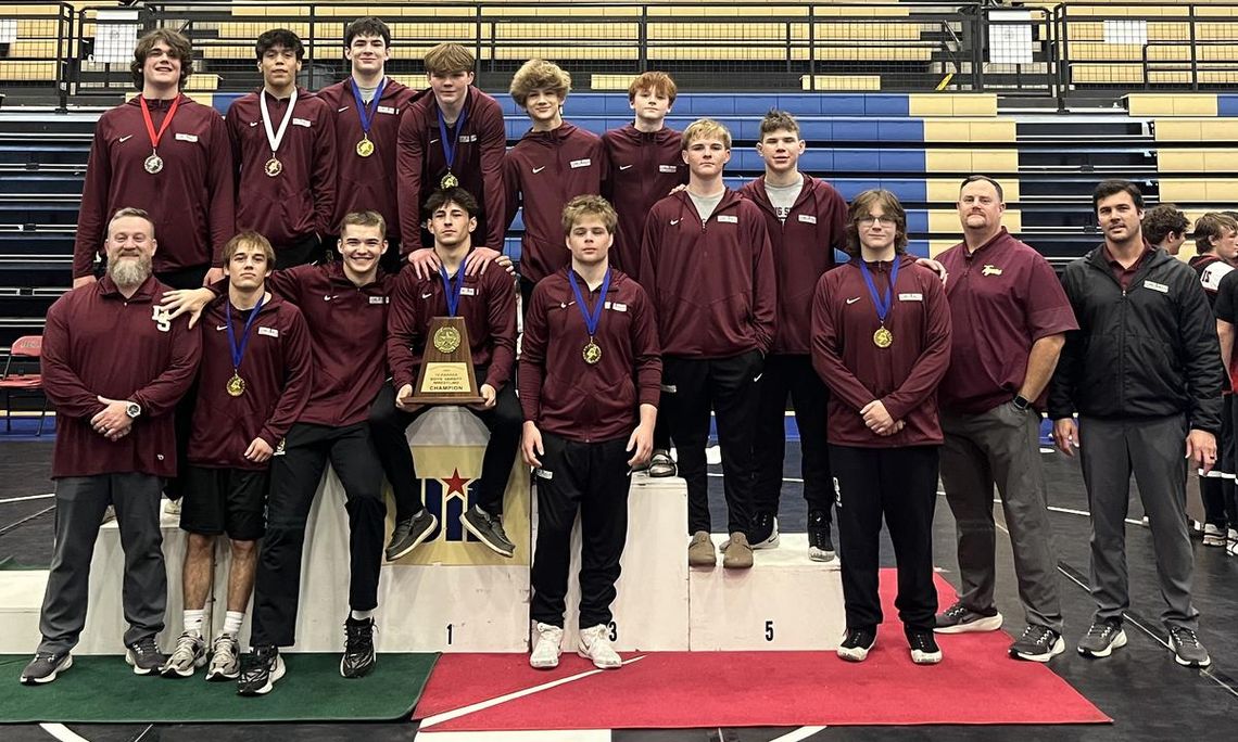 The varsity boys wrestling team took home the district championship.