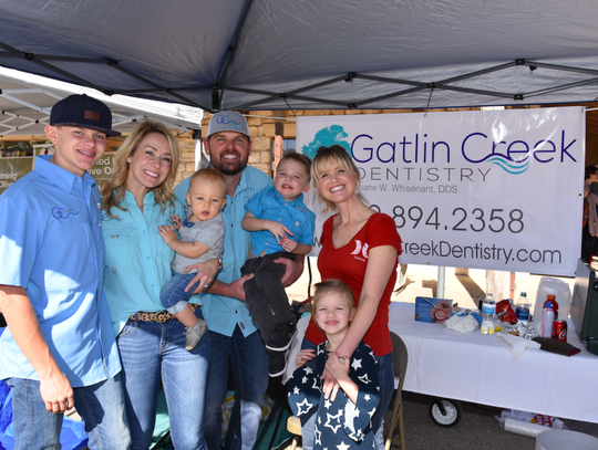 Dr. Shane Whisenant and family greeted people at their booth. From left to right: Chase Whisenant, Janey Whisenant, Ledger Whisenant, Dr. Whisenant, Beckham Whisenant, Lindsay Wallace, and Haidyn Wall