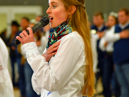 Arielle Wortham sings the national anthem to open the Hays County Livestock Show on Saturday at the Dripping Springs Ranch Park. CENTURY NEWS PHOTO BY JOHN PACHECO