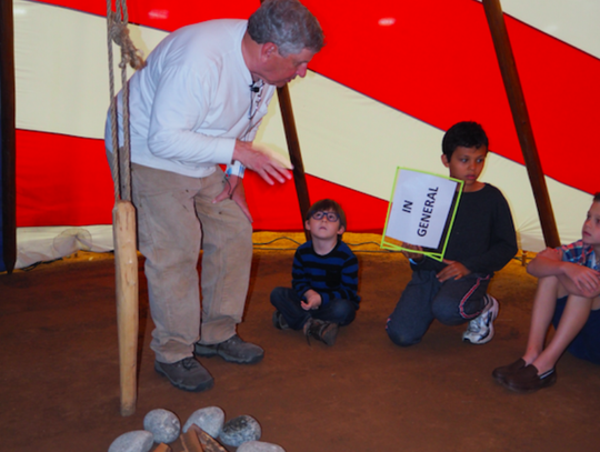 Peter Durkin told stories about the night sky from the Northern Cheyenne Indian tradition to children, inside a specially made tepee he made in the motif of an American Flag.