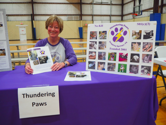 Sharon Bennett, a Board Member of Thundering PAWS, hosted the Thundering PAWS table. Thundering PAWS adoptable animals are carried weekly by the Century News.