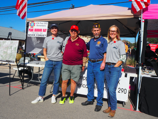 Kathryn Chandler, Ernest Barnasau, Marvin Smith, and Heather Page manning the Patriots' Hall Booth.