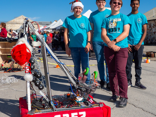 Members of the Spring Konstant robotics team demonstrate their robot, "Torsion", during Christmas on Mercer in Dripping Springs, Saturday, December 7th, 2019.