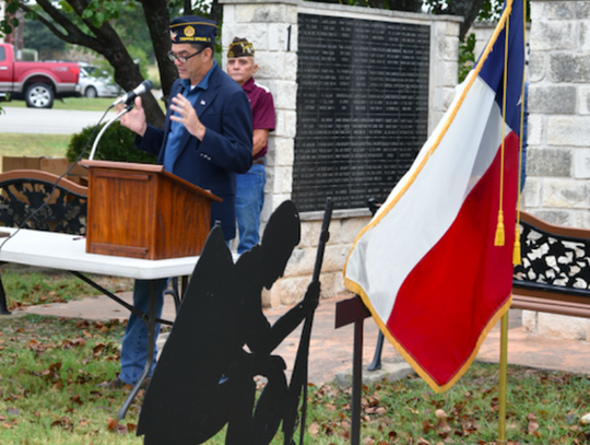 American Legion Commander Ben Adair delivers brief remarks.