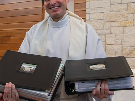 Father Garza also received scrapbooks full of photos of parishioners and events during his time at St. Martin.