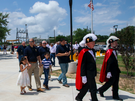 Fourth Degree Knights of Columbus lead the Corpus Christi procession.