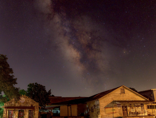 The Milky Way over the feed store on Mercer Street, approximately at 2 a.m.