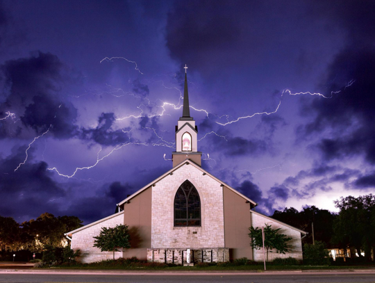 DS First Baptist Church during a thunderstorm