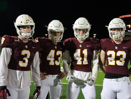 (Left to right) Defensive Back Stephen Crosby; Middle Linebackers Garland Hodges and Jackob Jou; and Outside Linebacker Keith Teague.