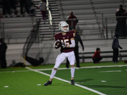 Quarterback, No. 15, Cameron O'banan gets ready to fire  the ball downfield