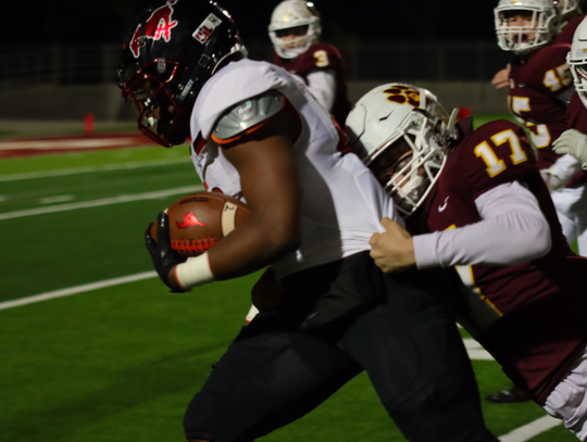 Hunter Northrup makes a tackle.