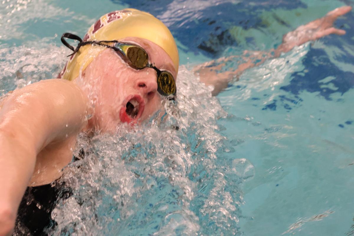 Freshman Charlotte Riffel swims in the Girls 500 Freestyle, finishing in 4th...