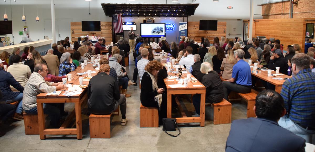 PHOTO BY LAURIE ANDERSON Chamber members listen to City Planning Director Tor...