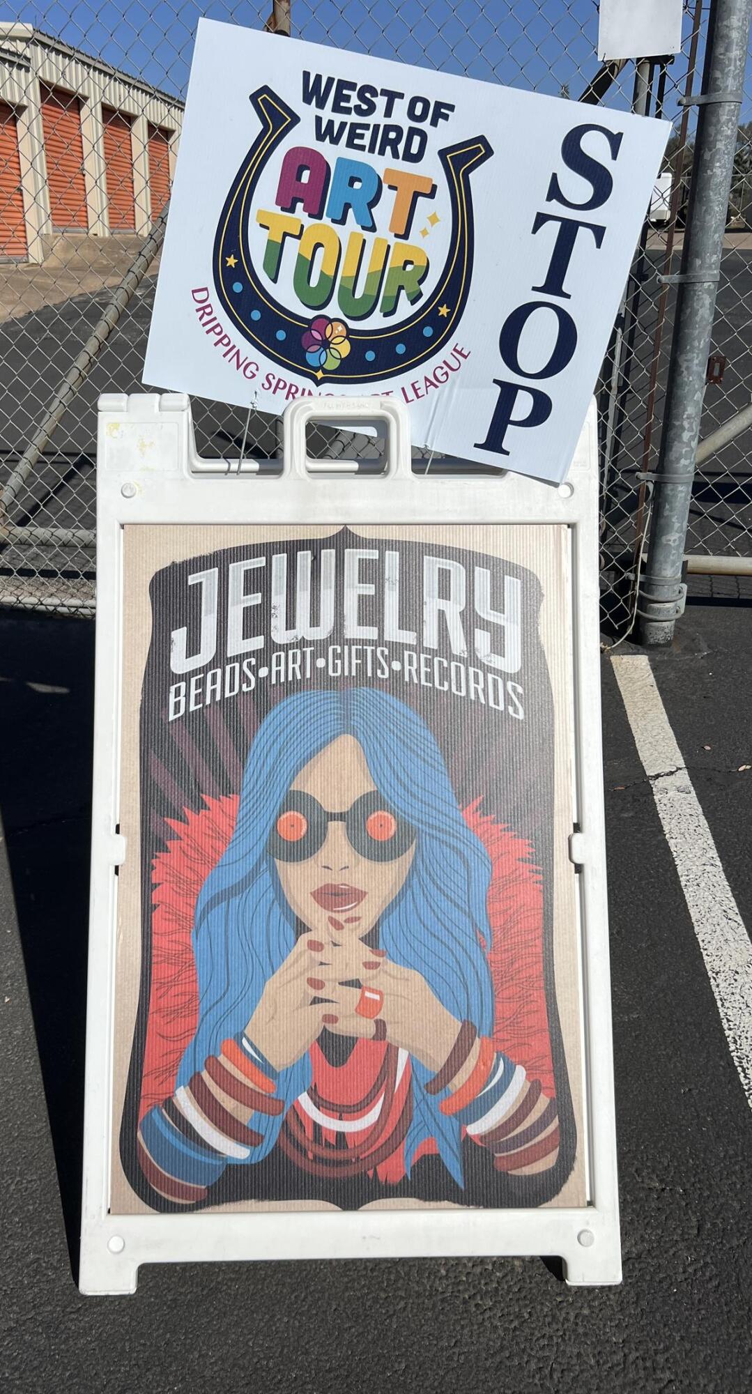 PHOTO BY LAURIE ANDERSON A sign directs the way to the Shops at Mars Beads.