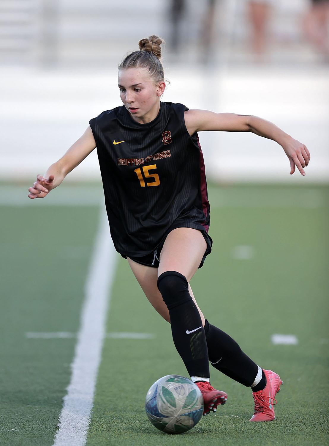 PHOTO BY VINCE CURLETTA Ella Castillo (#15) moves the ball down field against...