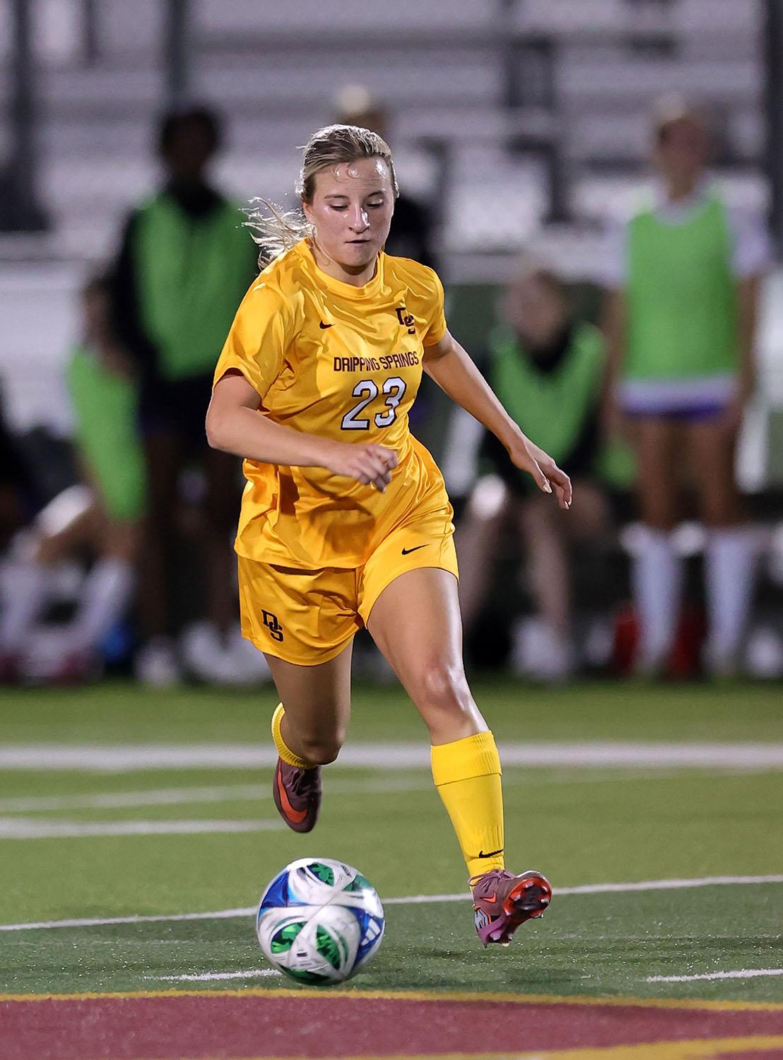 PHOTO BY VINCE CURLETTA  Josie Hardin (#23) moves the ball in Tuesday's game...
