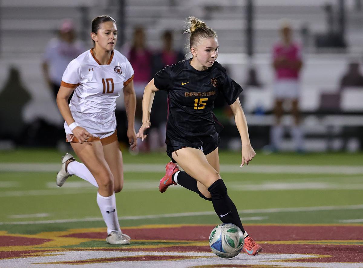 PHOTO BY VINCE CURLETTA Ella Castillo (#15) stays ahead of a Westwood player...