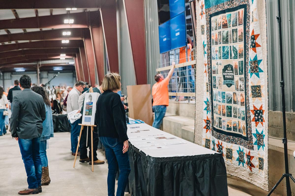 PHOTO COURTESY OF KATHERINE DRYE One of the auction items was a large quilt f...