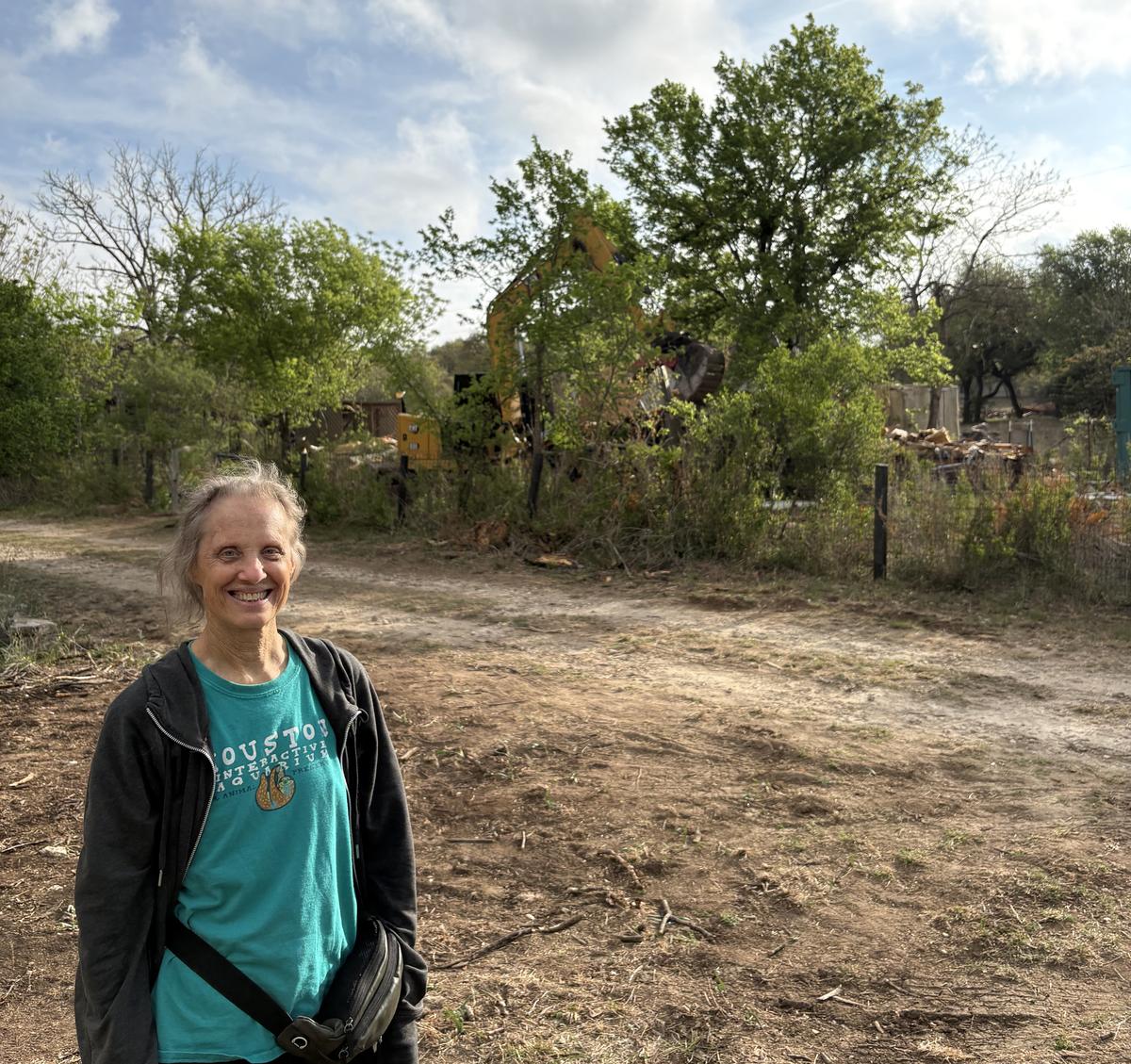 PHOTOS BY CHRIS KELKER-NEWLAN Melody Snell attends the demolition of her old...