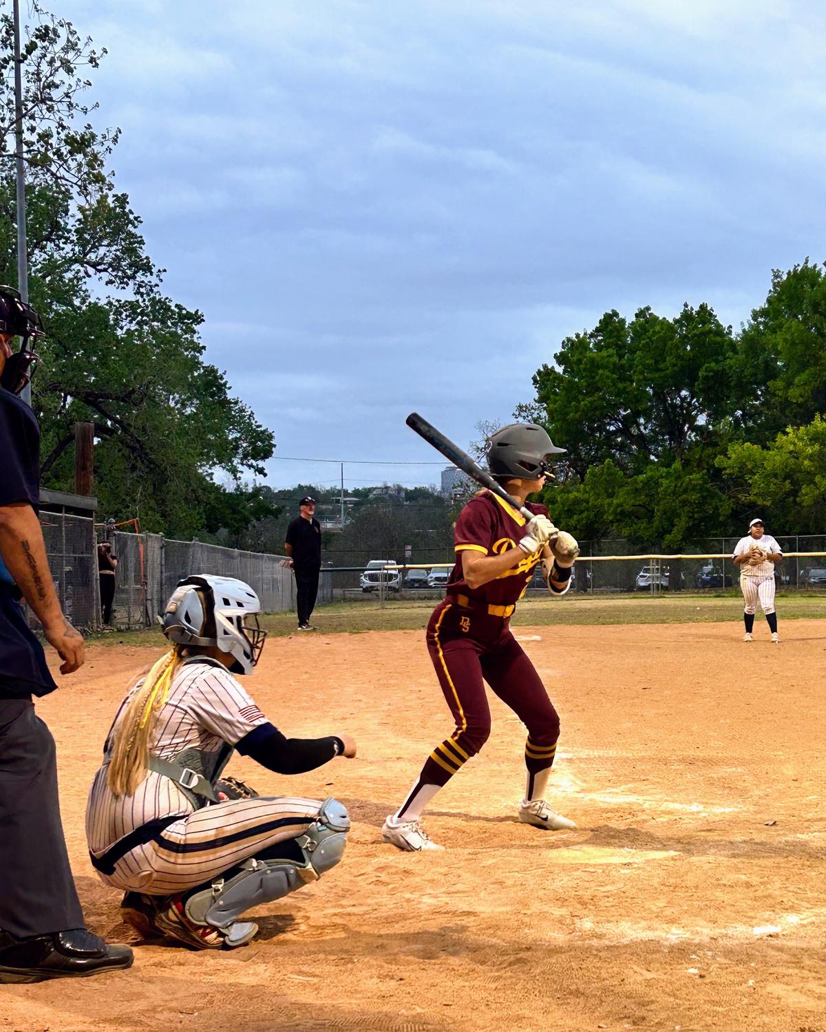 PHOTO BY CELESTE GAMBLE Morgan Riley goes to bat against Akins High School.