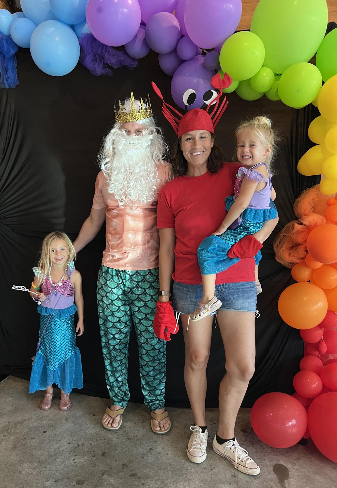 PHOTO BY LAURIE ANDERSON Stephen and Emily Phelps, with children Josephine an...