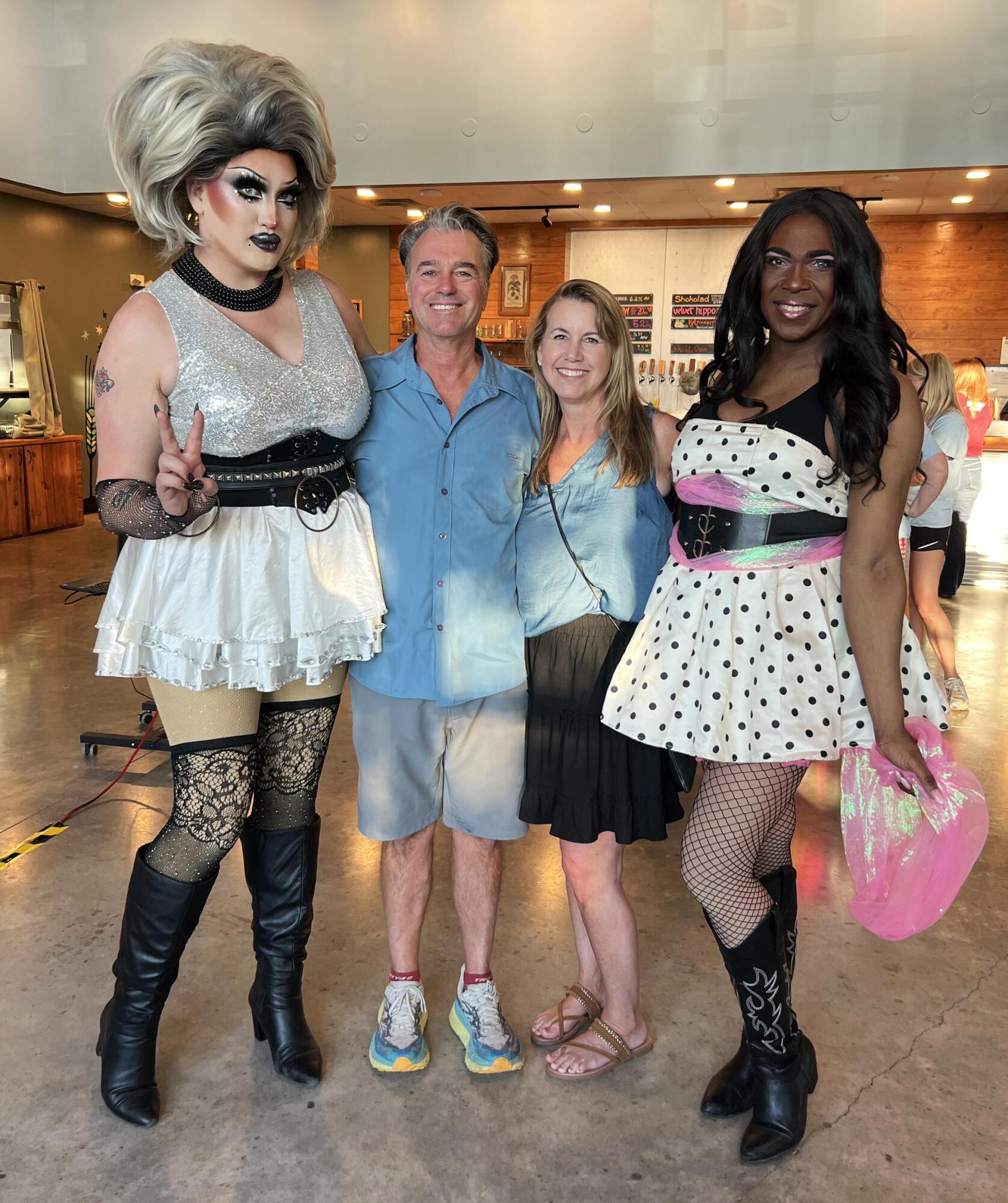 PHOTO BY LAURIE ANDERSON Bill Householder and Mica Gutierrez get a picture wi...