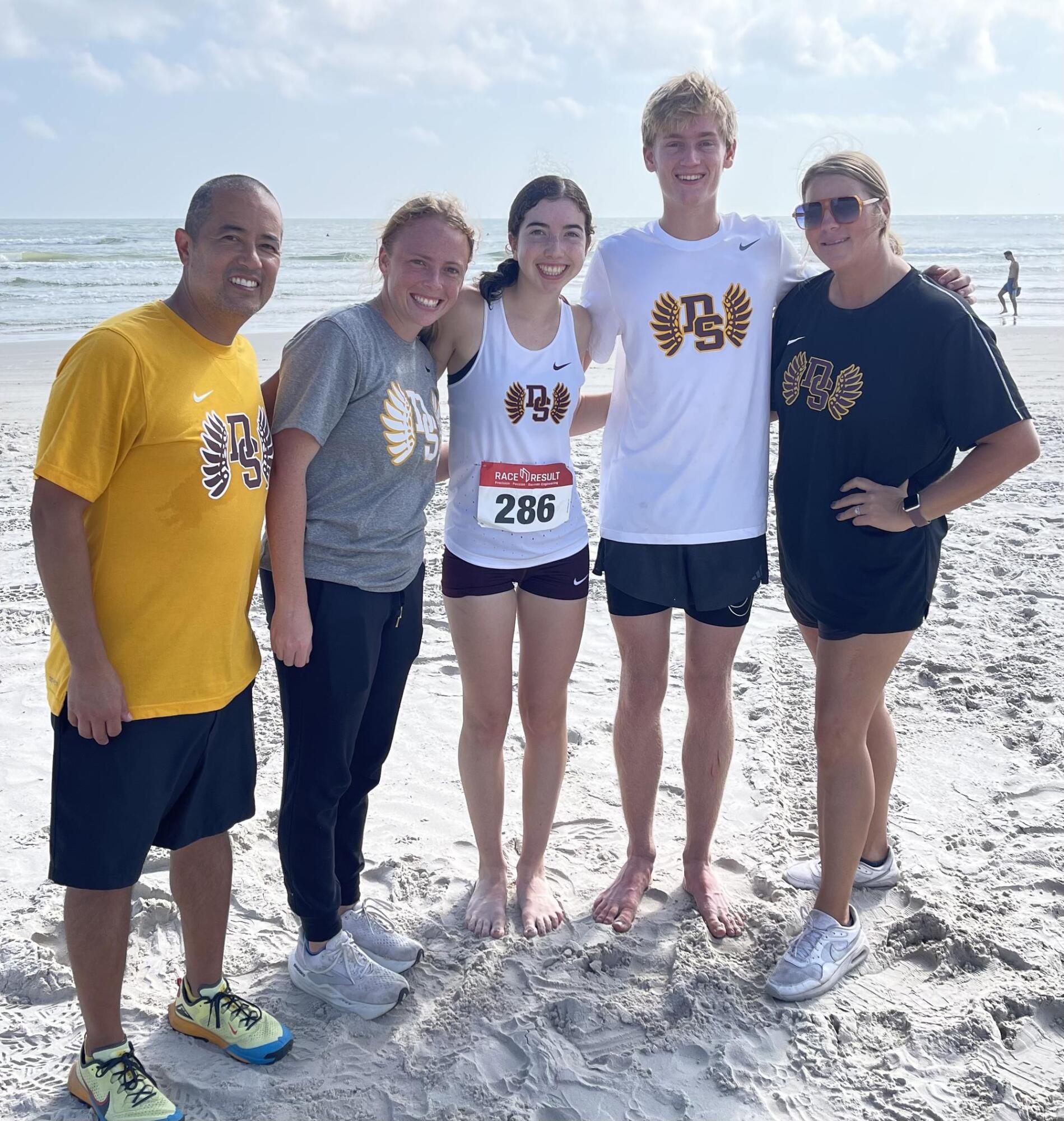 PHOTO BY GREG SCHUMACHER Coach Morales, Coach Puryear, Callie Schumacher, We...