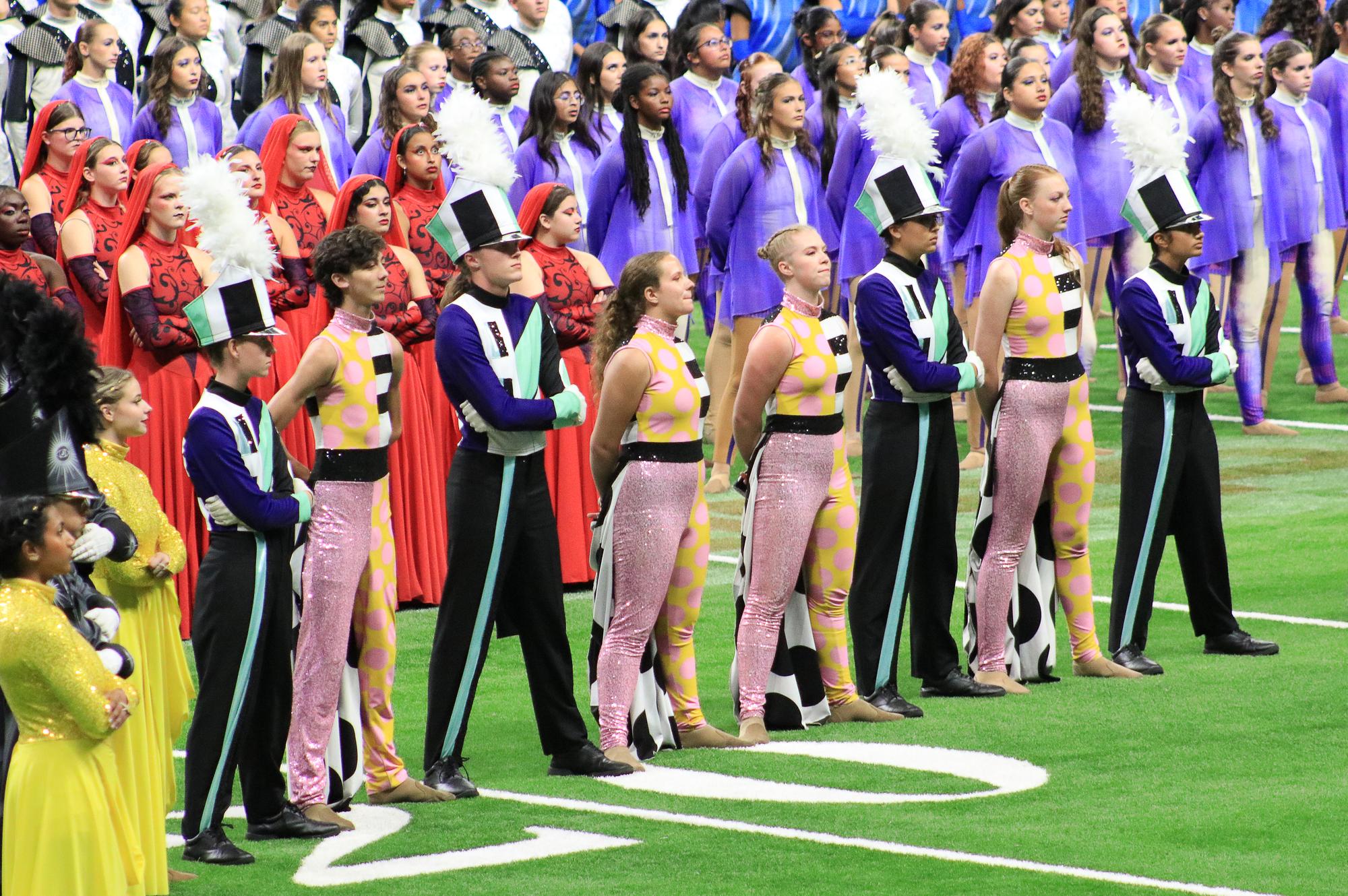 Drum majors and color guard captains wait for final results at the UIL State...