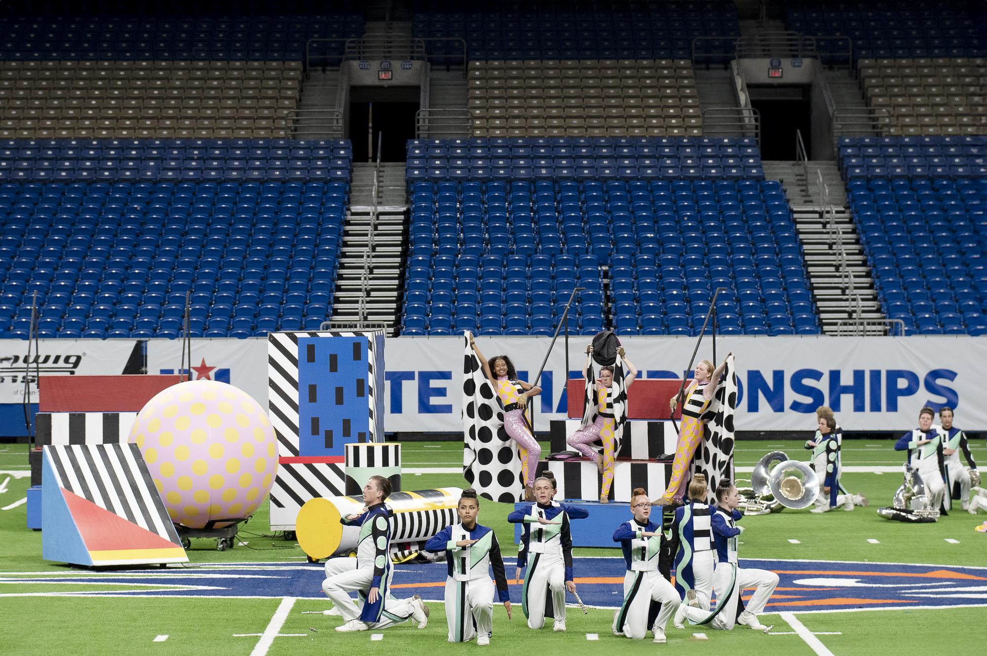 PHOTO BY KIM DEL ANGEL Tiger Band members of the flute and tuba sections alon...