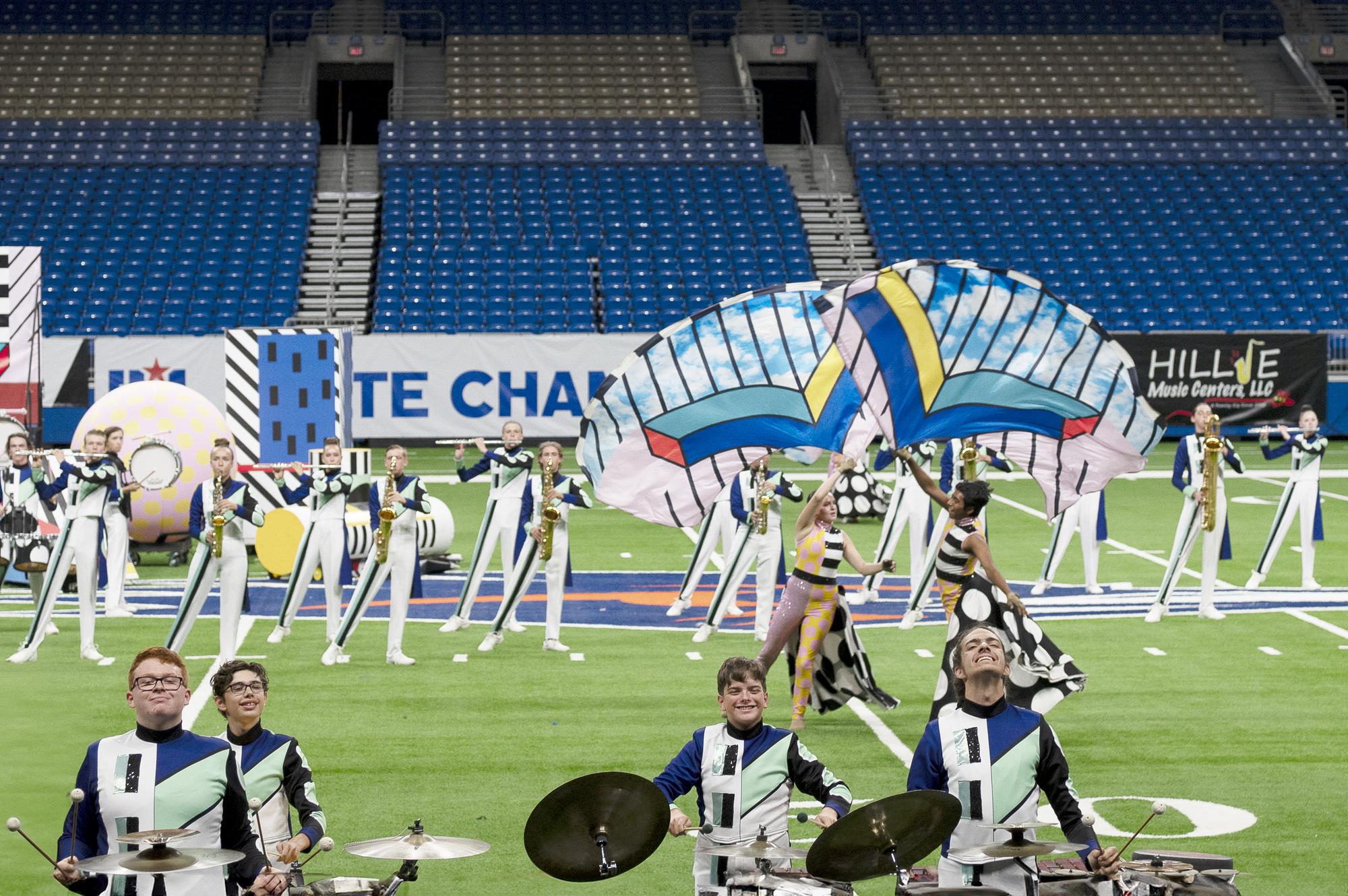 PHOTO BY KIM DEL ANGEL Tiger Band front ensemble members take joy seriously w...