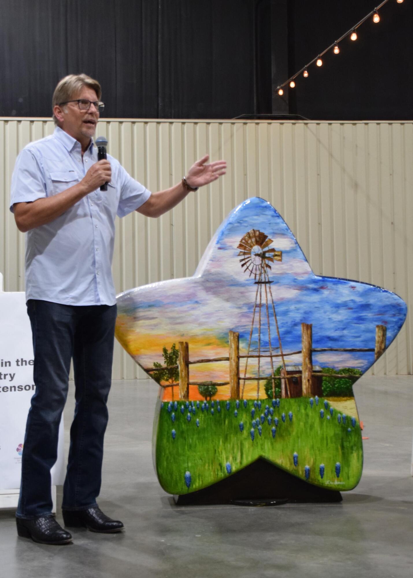 PHOTO BY LAURIE ANDERSON Joe Christenson with his creation, “Day & Night...