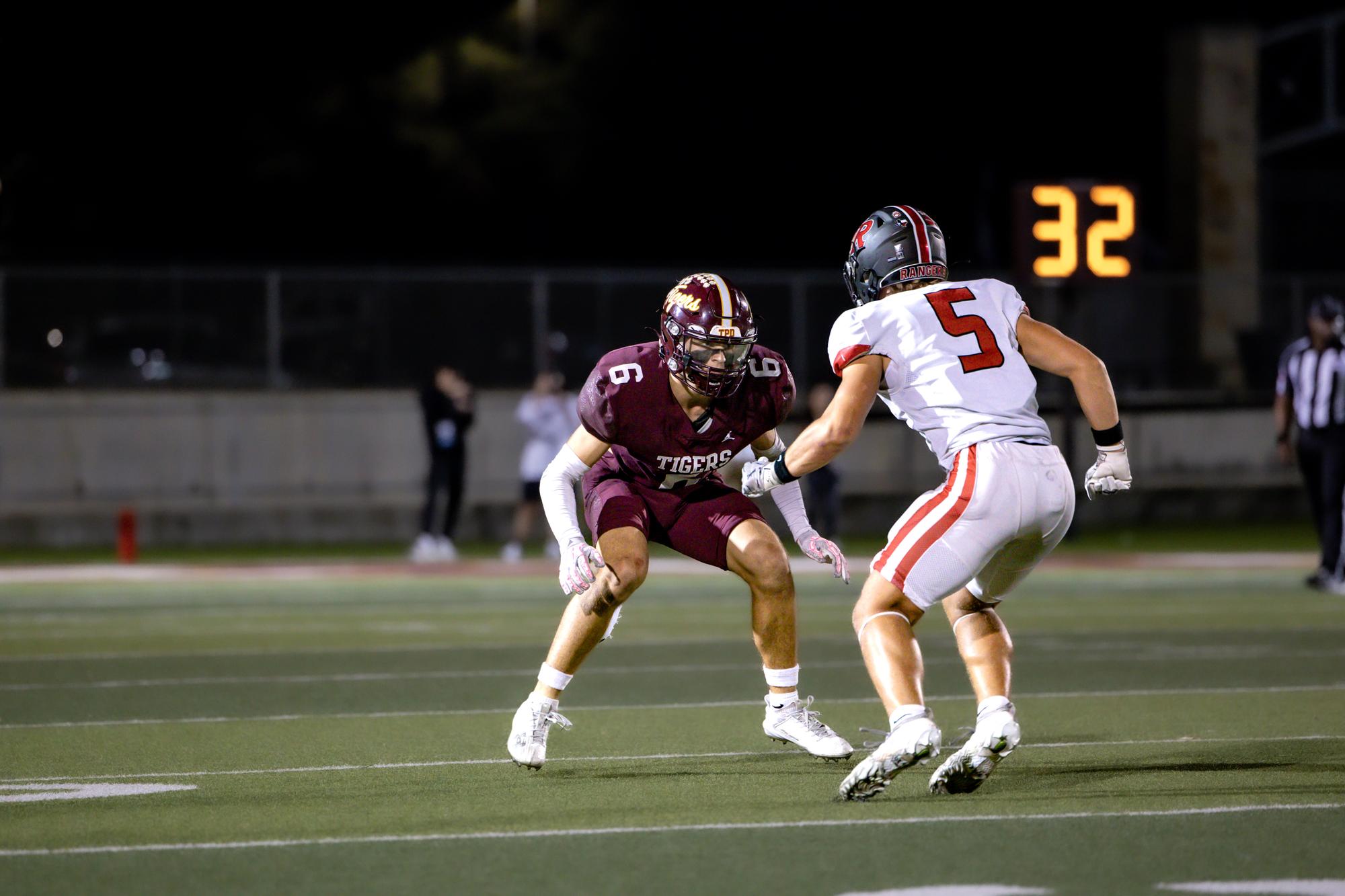 Photos courtesy of Cortni Reid Colten Tripp guards Vista Ridge’s Kieran Paegle.