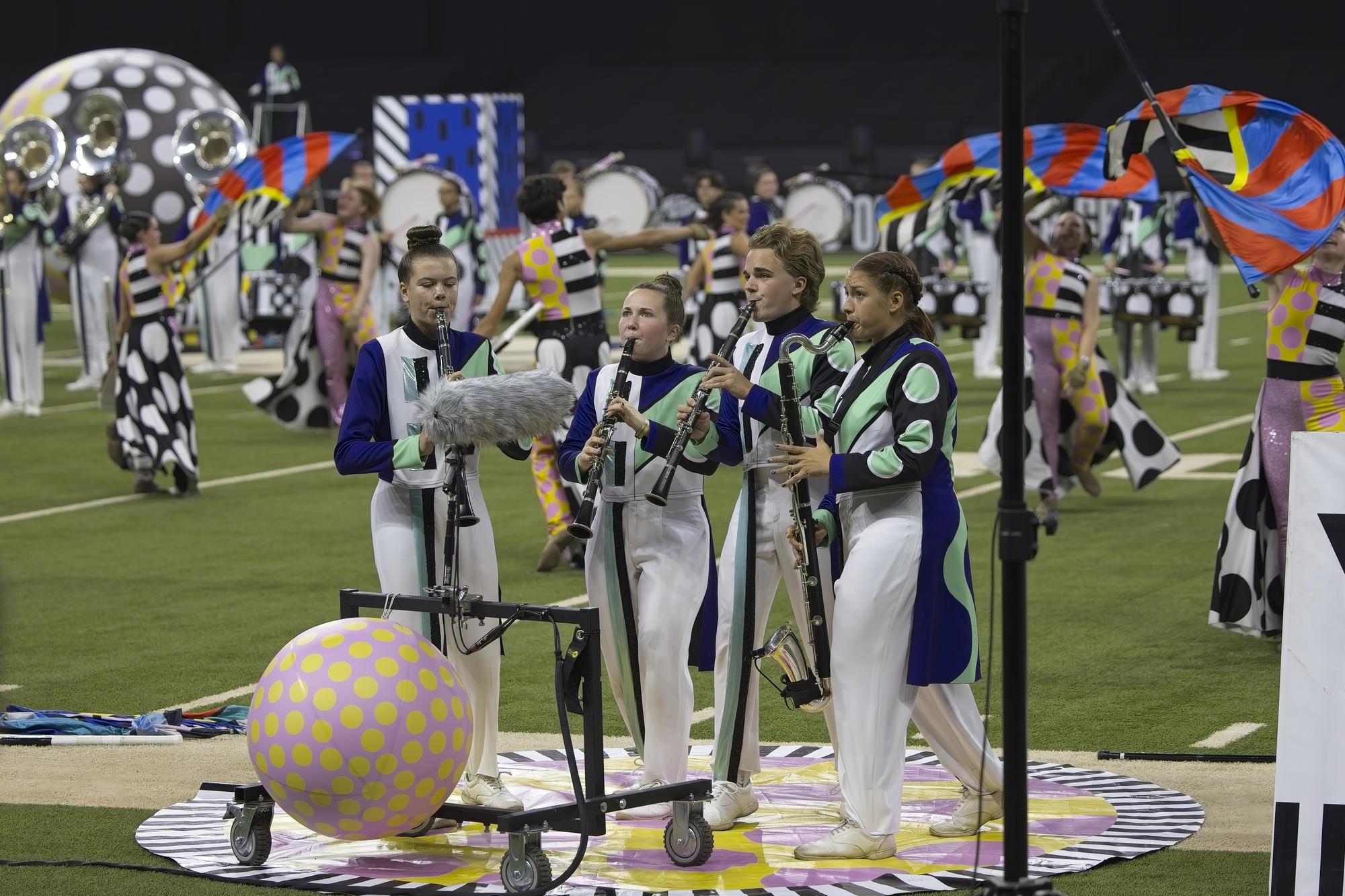 PHOTO BY RANDY CLARKE The band’s colorful performance earned 9th place at BOA...