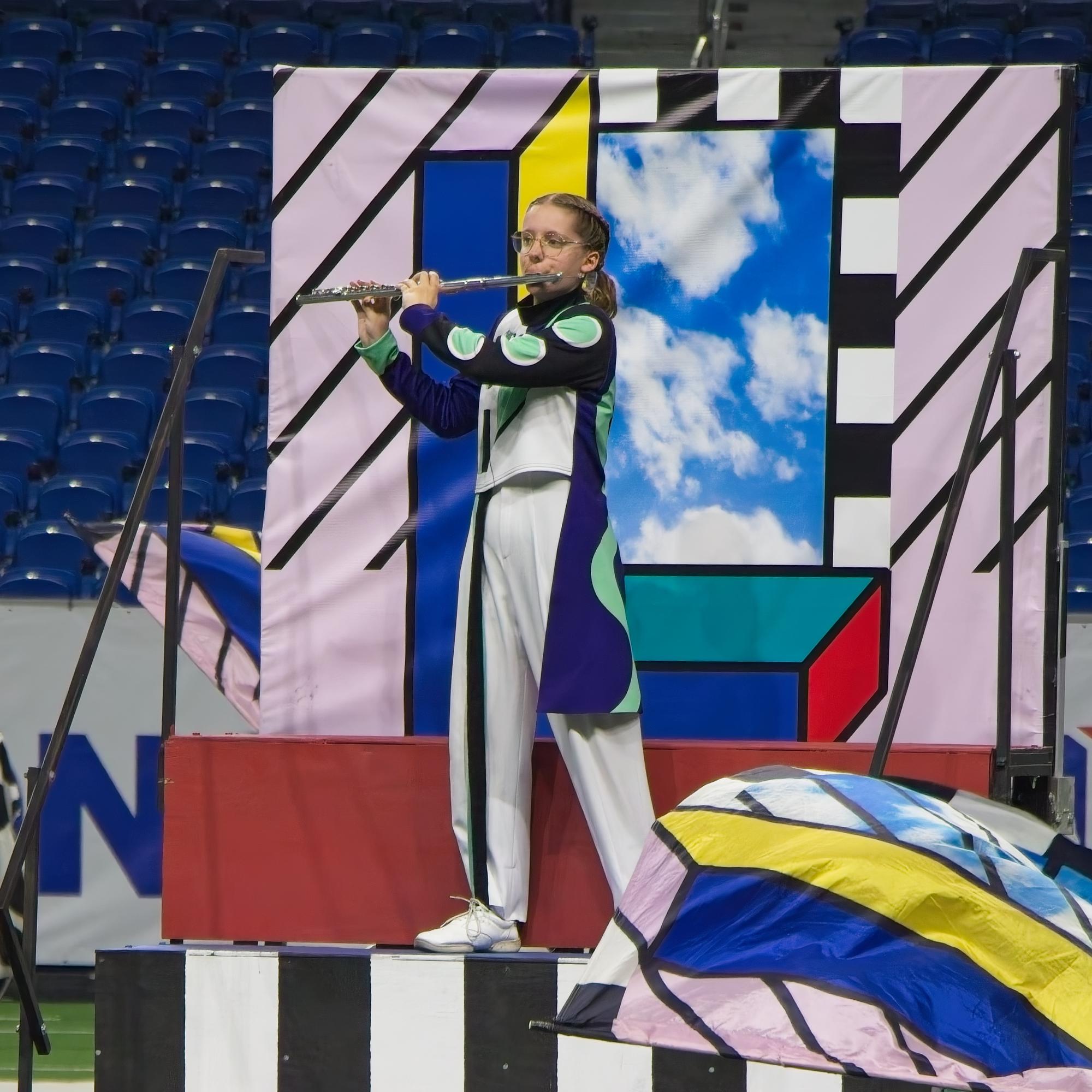 PHOTO BY RANDY CLARKE Erin Clarke performs a flute solo in the Alamodome at t...