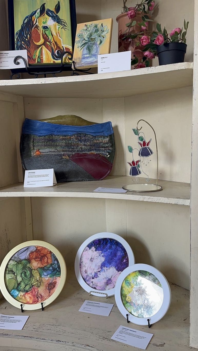 Member art on display at the DSAL Gallery Room at Rolling in Thyme & Dough